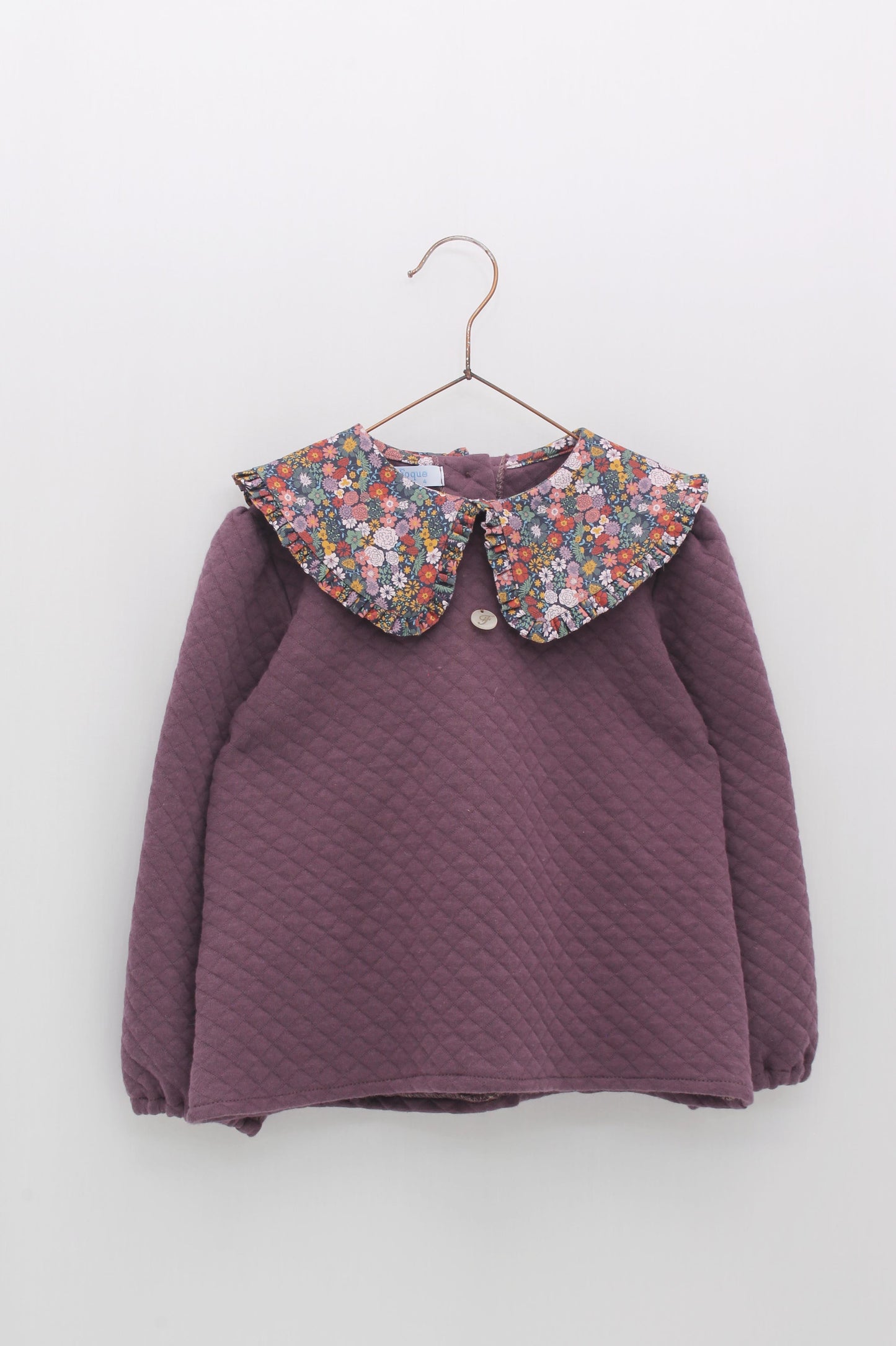 Conjunto cuello flores morado burdeos