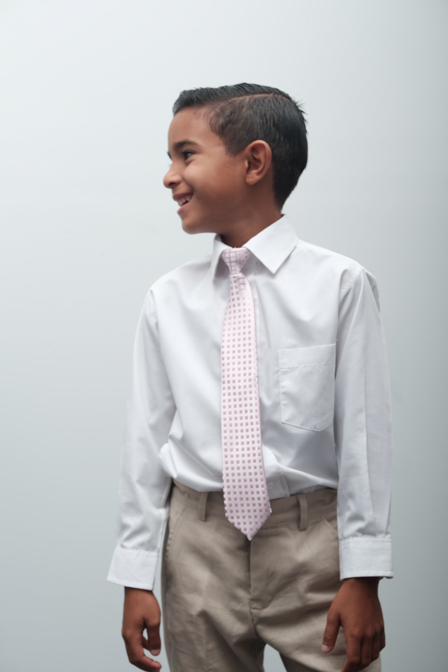 Corbata rosa con cuadros pequeños